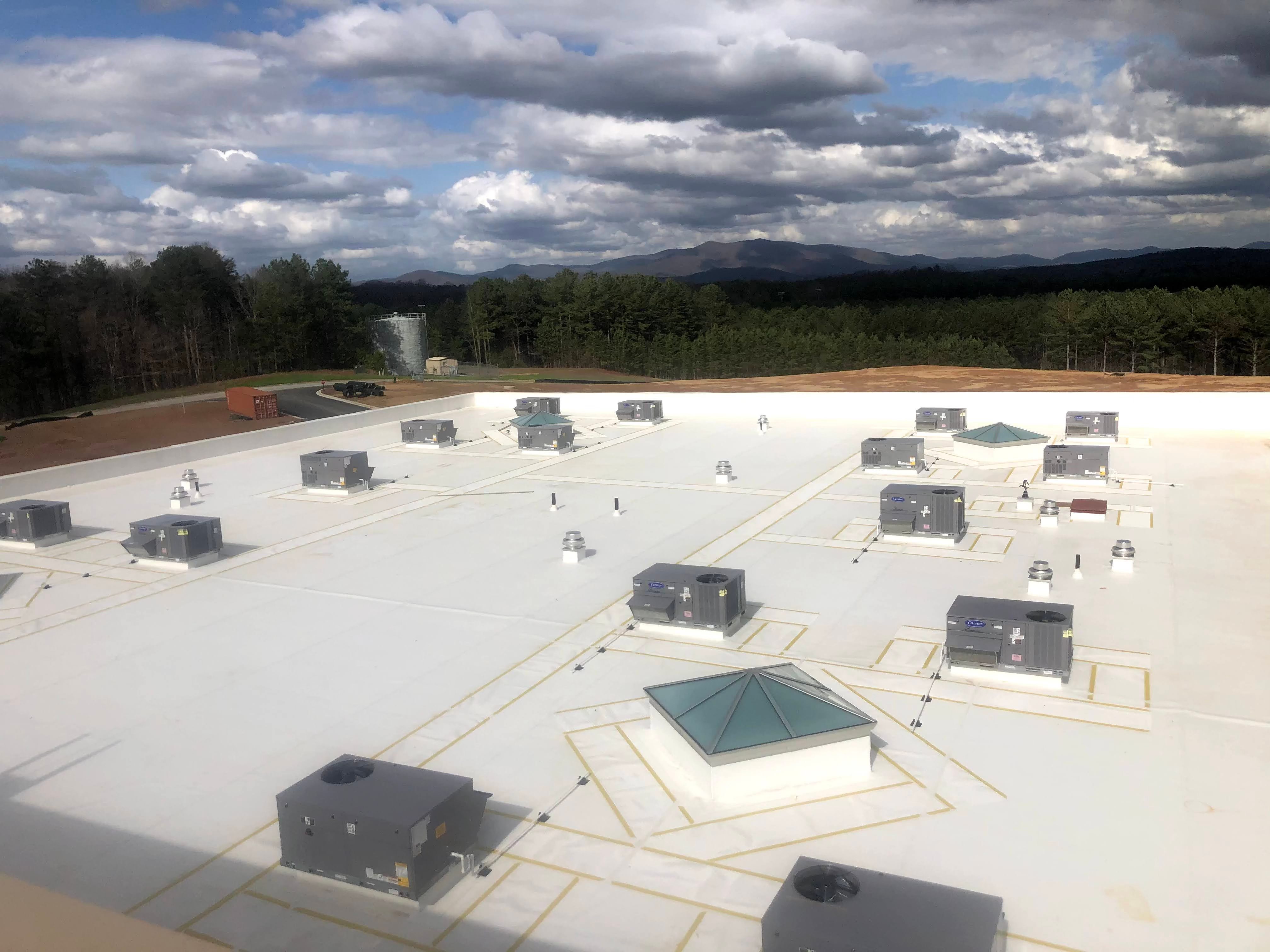 Why Georgia Businesses Trust Ark Roofing for Commercial Roof Replacements